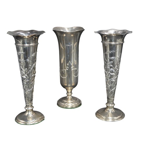 803 - A PAIR OF EDWARDIAN SILVER SPILL VASES, tapering trumpet form with repousse floral decoration, raise... 