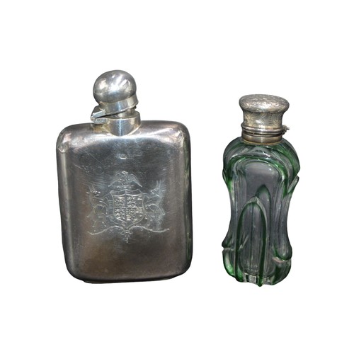 808 - A VICTORIAN SILVER HIP FLASK AND SILVER MOUNTED SCENT BOTTLE, the hip flask with chased armorial dec... 