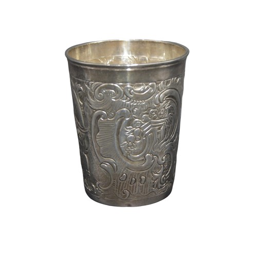 821 - A CONTINENTAL SILVER BEAKER, probably early 19th century, the sides decorated in repousse with a pho... 