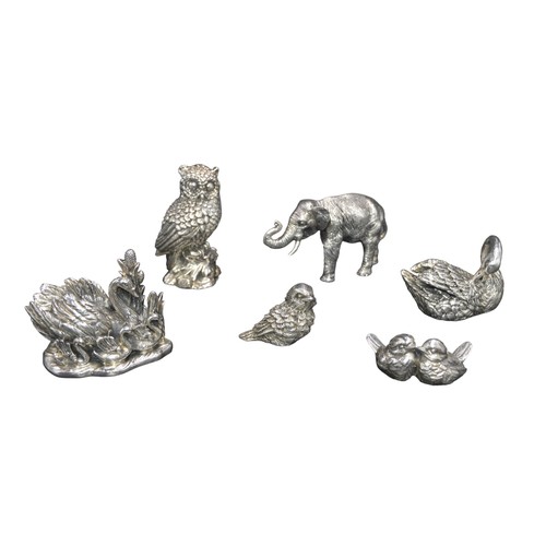 813 - A GROUP OF SIX SILVERED ANIMAL MODELS, 20TH CENTURY, naturalistically rendered to depict an elephant... 