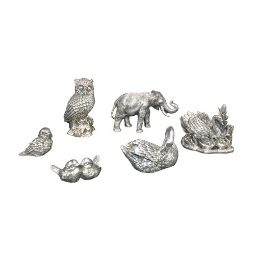 813 - A GROUP OF SIX SILVERED ANIMAL MODELS, 20TH CENTURY, naturalistically rendered to depict an elephant... 