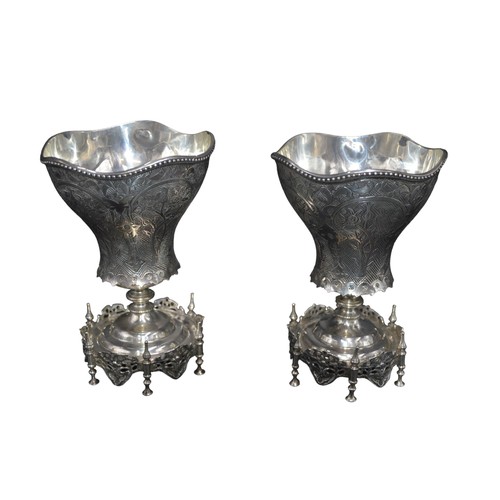 820 - TWO SILVER OTTOMAN SHERBERT SPOON HOLDERS, 19TH CENTURY, tapering lobed form with beaded rim and cha... 