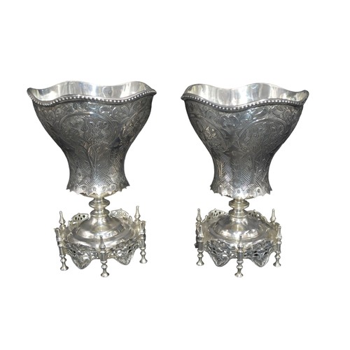 820 - TWO SILVER OTTOMAN SHERBERT SPOON HOLDERS, 19TH CENTURY, tapering lobed form with beaded rim and cha... 