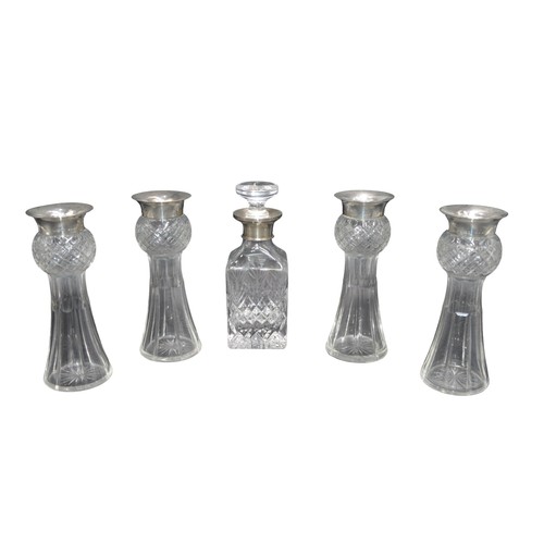 807 - A SET OF FOUR VINTAGE CUT GLASS SILVER MOUNTED THISTLE VASES, the silver mounts marked Birmingham, 1... 