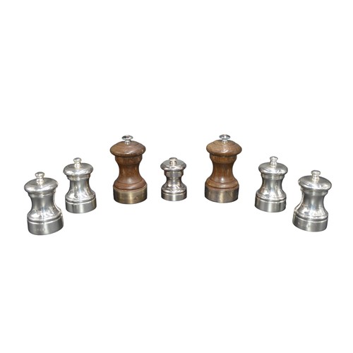 804 - A MIXED GROUP OF SEVEN SILVER AND SILVER MOUNTED PEPPER MILLS, including a group of four marked Lond... 