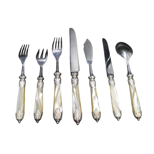 830 - A NEAR SET OF VINTAGE FRENCH 'DINERS EN VILLE' CUTLERY, faux mother of pearl handles with ornate scr... 