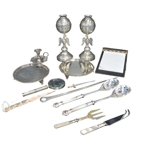 827 - A GROUP OF SILVER PLATED WARES, including a pair of salvers, a rocaille decorated chamber stick, mea... 