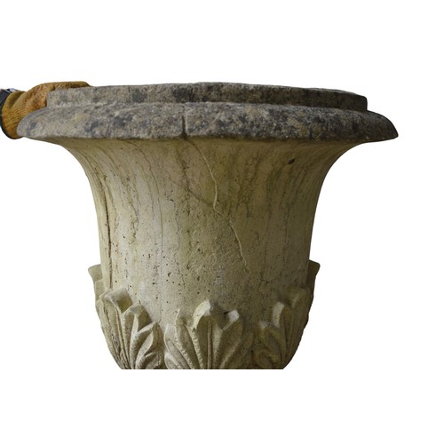 135 - A LARGE RECONSTITUTED STONE URN ON PLINTH, in three sections, good weathered appearance130 cm high, ... 