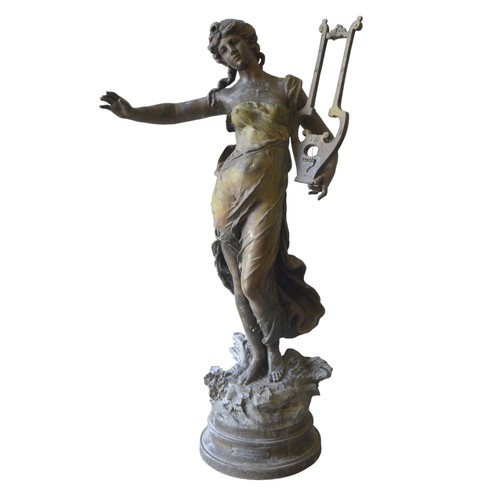 420 - AFTER AUGUSTE MOREAUGENIE DE LA MUSIQUEa large patinated spelter figure with integral socle base84 c... 