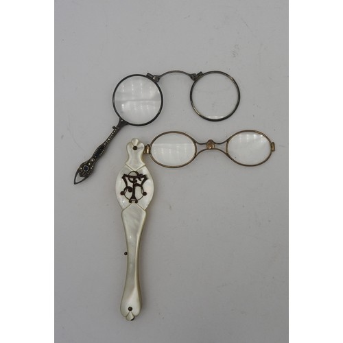 614 - TWO VINTAGE PAIRS OF LORGNETTES, EARLY 20TH CENTURY, a mother of pearl handled pair and a marquisite... 