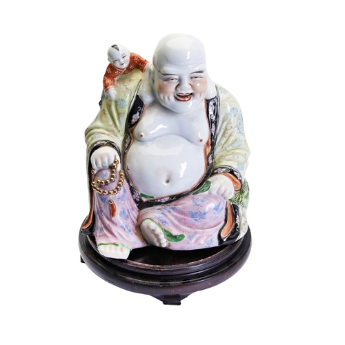 173 - A CHINESE FAMILLE ROSE FIGURE OF SEATED LAUGHING BUDDHA OF PROSPERITY, REPUBLIC PERIOD, with an infa... 