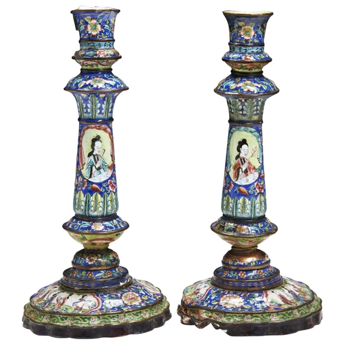 128 - PAIR OF CANTON ENAMEL CANDLESTICKSQIANLONG PERIOD (1736-1795)decorated in coloured with elegant ladi... 