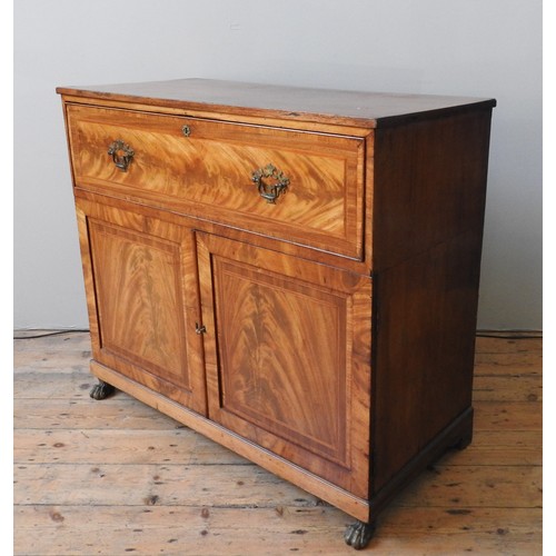 27 - AN EARLY 19TH CENTURY CROSSBANDED MAHOGANY SECRETAIRE CUPBOARD, the long frieze drawer opening to re... 