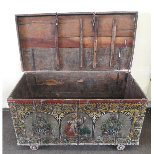 33 - A LARGE INDIAN TEAK SANDOOK CHEST, the iron banded teak chest profusely painted with hindu deities a... 