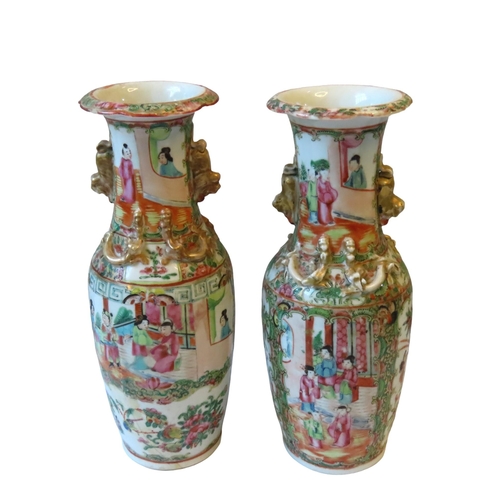 152 - A PAIR OF FAMILLE ROSE BALUSTER VASES, 19TH/20TH CENTURY, the sides decorated with palace scenes fea... 