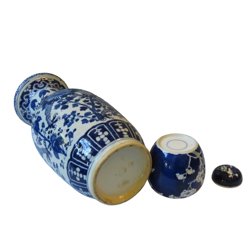 157 - A LARGE CHINESE BLUE & WHITE BALUSTER VASE, 19TH/20TH CENTURY, the sides painted with twin scaly... 