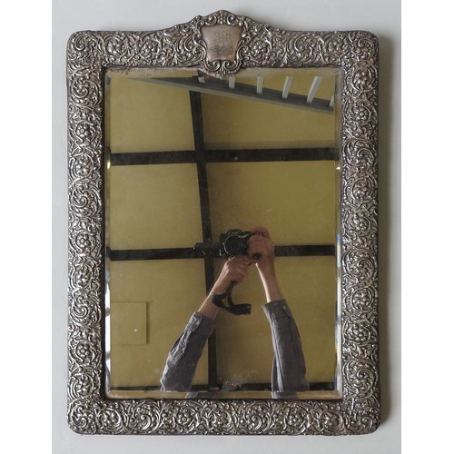 595 - A LARGE SILVER FRAMED TABLE MIRROR, 19TH CENTURY, original bevelled plate within a cushion form fram... 