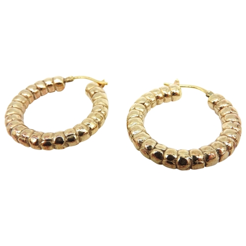 531 - A PAIR OF ITALIAN SILVER GILT HOOP EARRINGS, graduated bobbin form, stamped 'Italy 925'5 grams