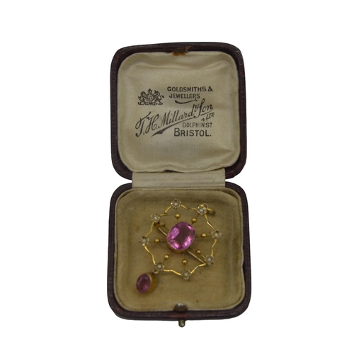 533 - A LATE VICTORIAN 9CT PINK PASTE, SEED PEARL AND GOLD PENDANT BROOCH, CIRCA 1890the central cushion-c... 