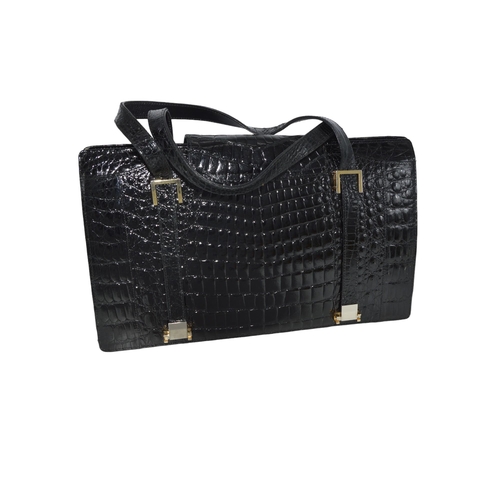 515 - BLACK CROCODILE SKIN STRUCTURED HAND BAG with two large inner compartments and a third large zipped ... 