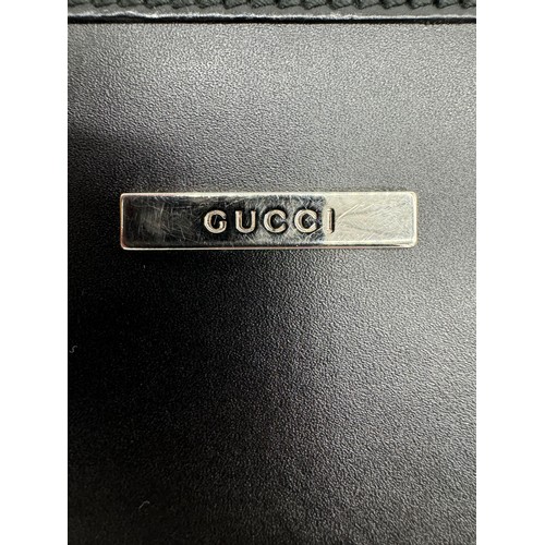 516 - GUCCI BLACK LEATHER DOCUMENT BRIEFCASE BAG CIRCA 1975/1980 Three large compartments with one inner z... 