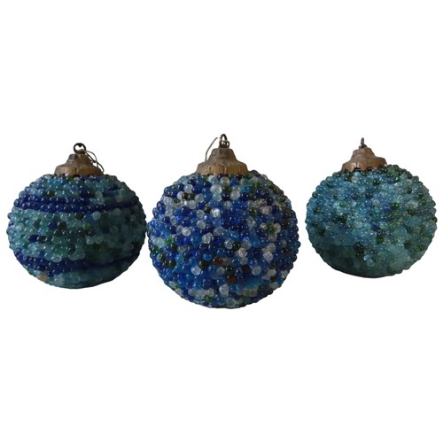 327 - A GROUP OF THREE VINTAGE FRENCH GLASS BEAD PENDANT LIGHTS, the spherical form wire work shades cover... 