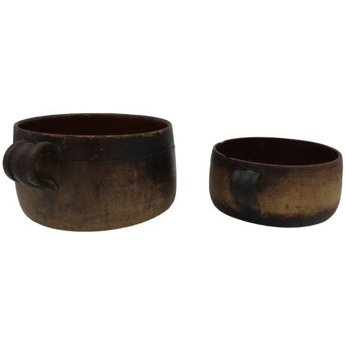 303 - TWO VINTAGE VALLAURIS EARTHENWARE COOKING POTS, with glazed interiors and applied ring handles, both... 