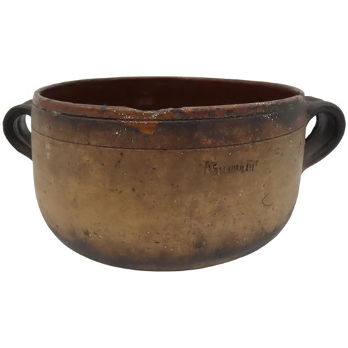 303 - TWO VINTAGE VALLAURIS EARTHENWARE COOKING POTS, with glazed interiors and applied ring handles, both... 