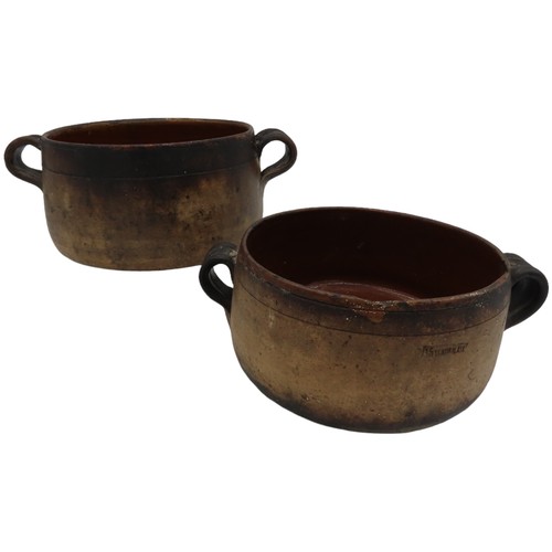 303 - TWO VINTAGE VALLAURIS EARTHENWARE COOKING POTS, with glazed interiors and applied ring handles, both... 