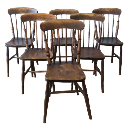 25 - A SET OF SIX SPINDLE BACK WINDSOR CHAIRS, LATE 19TH CENTURY, the elm saddle seats raised on ring tur... 