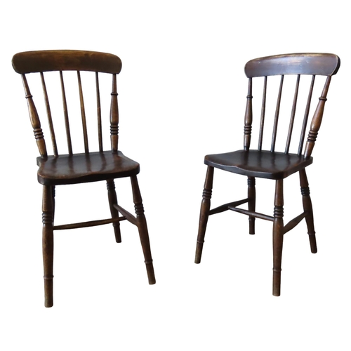 25 - A SET OF SIX SPINDLE BACK WINDSOR CHAIRS, LATE 19TH CENTURY, the elm saddle seats raised on ring tur... 