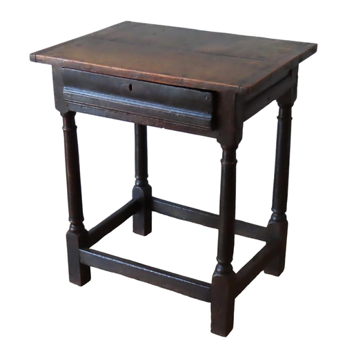 53 - A LATE 18TH CENTURY OAK SIDE TABLE, rectangular top over single frieze drawer, raised on turned legs... 