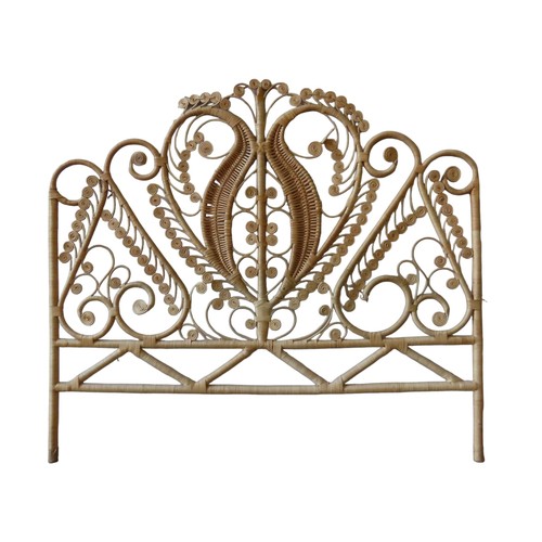 28 - A VINTAGE 'BOHO' RATTAN HEADBOARD, ornate scrolling peacock pattern122cm x 137cm