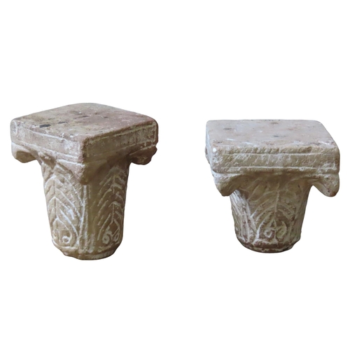 78 - TWO INDIAN CARVED STONE CAPITALS, tapering form with square tops, the sides with scroll foliate carv... 