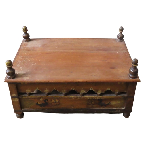 30 - AN INDIAN PAINTED TEAK BAJOT TABLE, rectangular top over an arcaded frieze, the sides painted with f... 