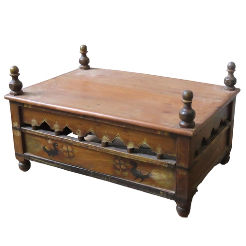 30 - AN INDIAN PAINTED TEAK BAJOT TABLE, rectangular top over an arcaded frieze, the sides painted with f... 