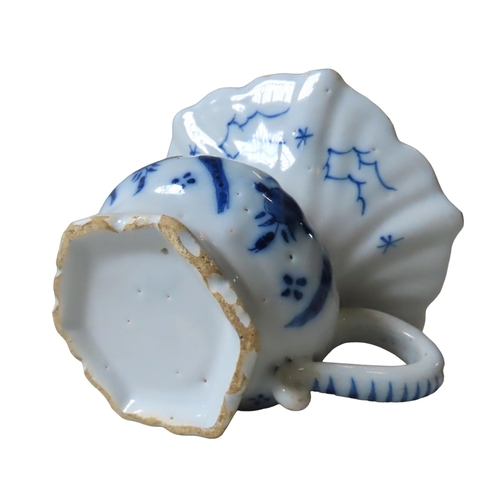 304 - AN UNUSUAL DELFT CUSPIDOR, MID 18TH CENTURY, with a flared hexagonal undulating rim, waisted body wi... 