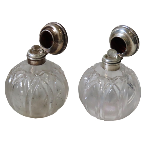 587 - A PAIR OF VINTAGE GLASS SCENT BOTTLES, lobed globular form with with silver and tortoiseshell hinged... 