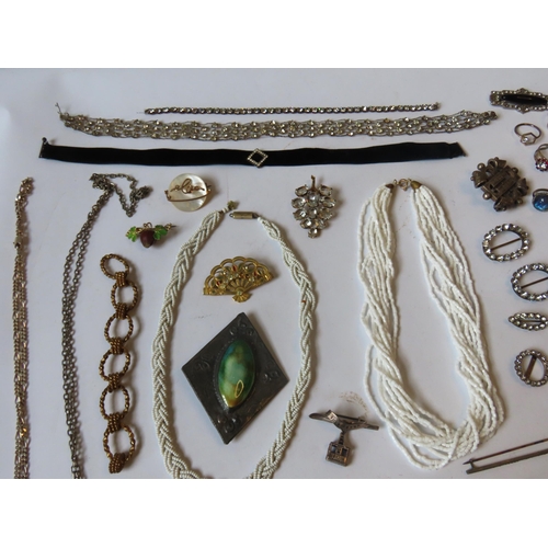 527 - A MIXED GROUP OF COSTUME JEWELLERY, the lot includes a snake bangle, silver crucifix on chain, and n... 