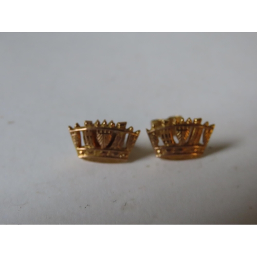 542 - A PAIR OF 9CT GOLD CROWN FORM STUD EARRINGS, together with two dress rings and a boxed button set