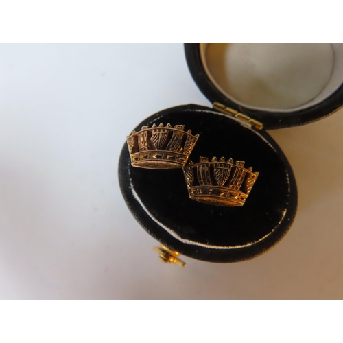 542 - A PAIR OF 9CT GOLD CROWN FORM STUD EARRINGS, together with two dress rings and a boxed button set