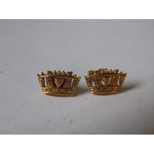 542 - A PAIR OF 9CT GOLD CROWN FORM STUD EARRINGS, together with two dress rings and a boxed button set