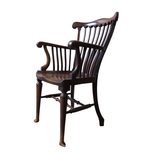 57 - A LATE VICTORIAN MAHOGANY 'CLERIC'S' ELBOW CHAIR, yoke form top rail over undulating slats, the sadd... 