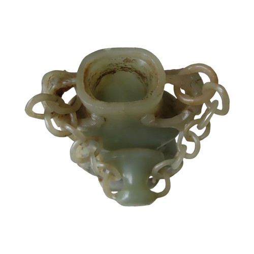 124 - CHINESE CARVED JADE VASE 20TH CENTURY IN THE ARCHAIC STYLE22.5cm high4cm deep