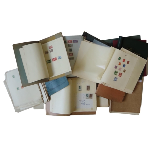 491 - A QUANTITY OF LOOSE-LEAF STAMP ALBUMS AND FOLDERS CONTAINING A LARGE QUANTITY OF ASSORTED STAMPS.