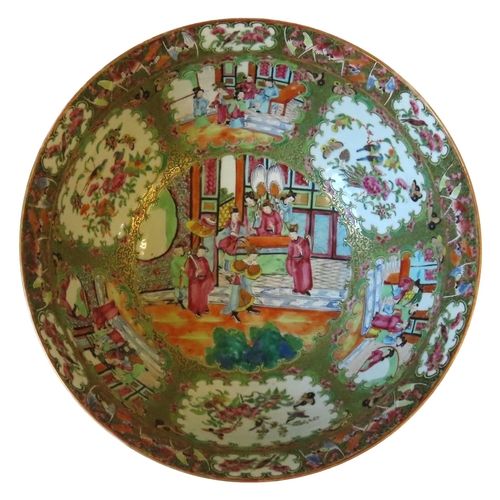 210 - A CANTONESE PUNCH BOWL OF TYPICAL DECORATION, the centre decorated with a  court scene, 19th century... 