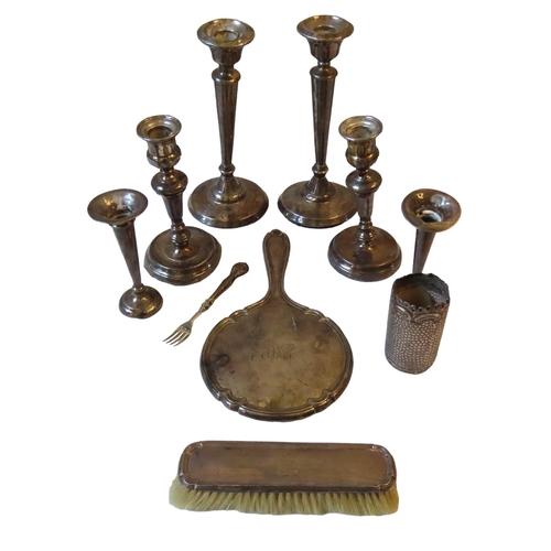 592 - TWO PAIRS OF WEIGHTED SILVER CANDLESTICKS AND OTHER SILVER WARES, the lot also includes a pair of sp... 