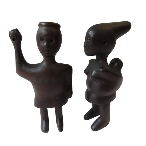 90 - A HEDDLE PULLEY, IVORY COAST, 20th century and two carved wooden figures.28 cms max