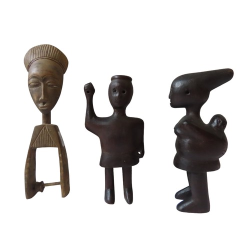 90 - A HEDDLE PULLEY, IVORY COAST, 20th century and two carved wooden figures.28 cms max