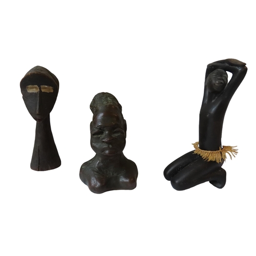 91 - A BRONZE BUST OF AN AFRICAN WOMAN, a pottery figure of an African girl and a Lega Janus-head figure ... 